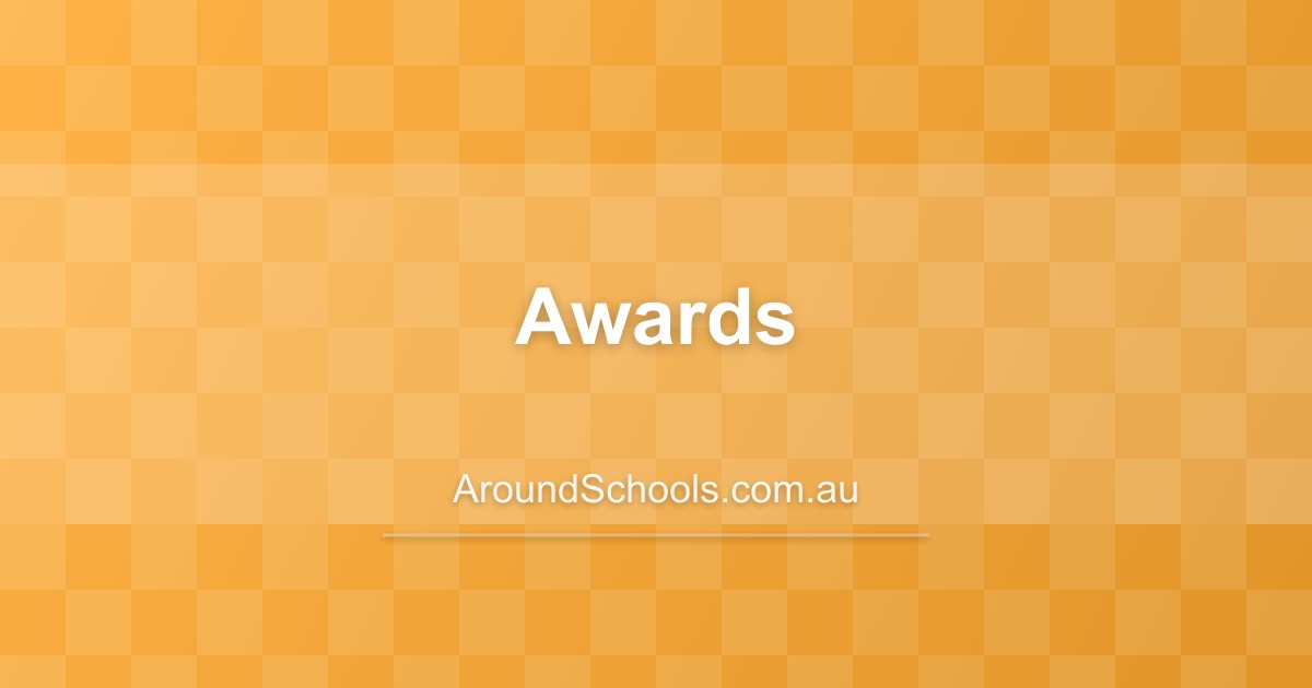 Students receiving awards at ceremony